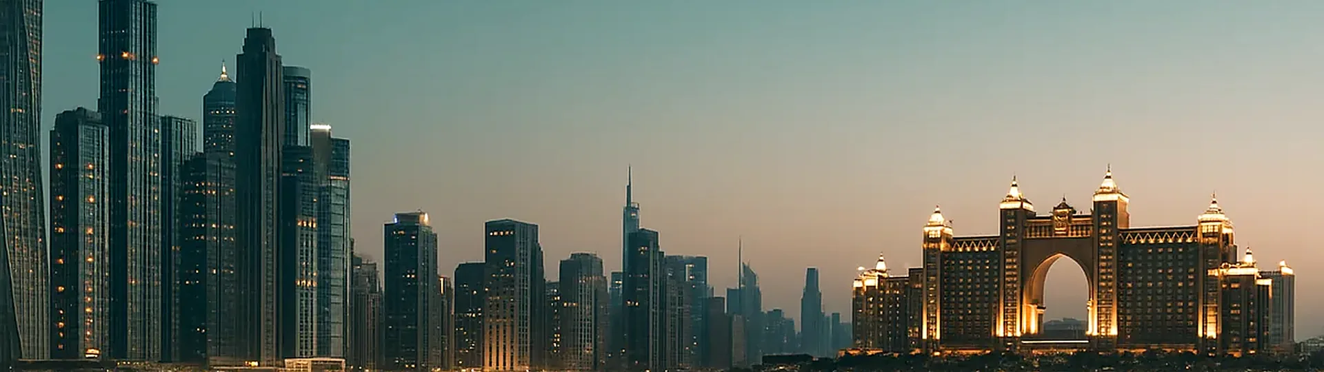 Panoramic view of luxury hotels along the Dubai Marina skyline at sunset representing Middle East hospitality growth